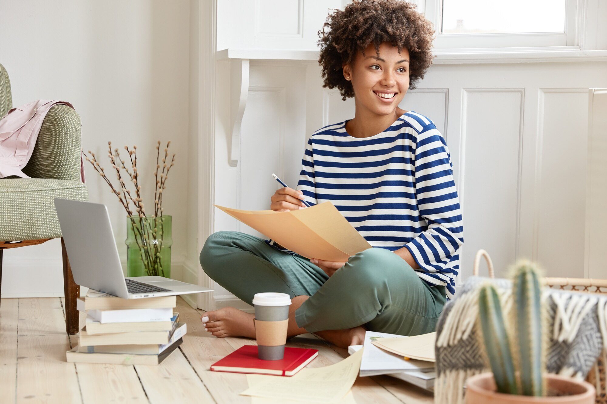 Positive Black Woman Preparing Report