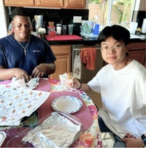 Two Man Eating Lunch